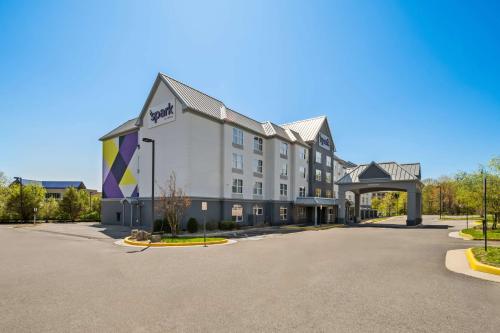 a rendering of the inn at the park at Spark By Hilton Woodbridge in Woodbridge
