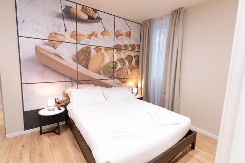Postel nebo postele na pokoji v ubytování Bed&Bakery
