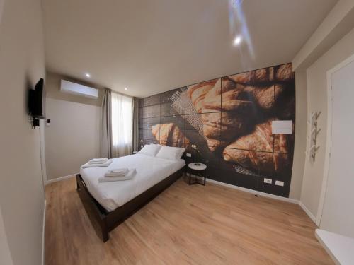 Postel nebo postele na pokoji v ubytování Bed&Bakery