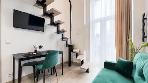 Televiisor ja/või meelelahutuskeskus majutusasutuses Loftas Smaragdas