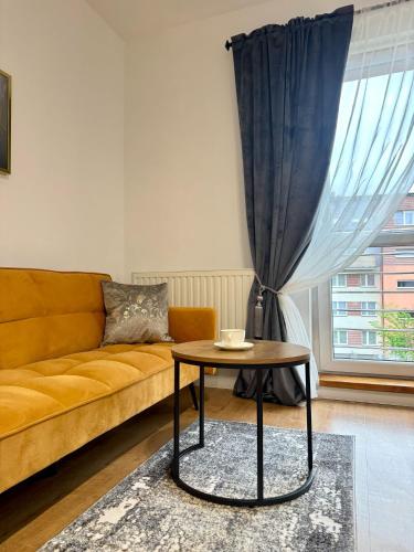 Χώρος καθιστικού στο Apartament na Zagrodowej