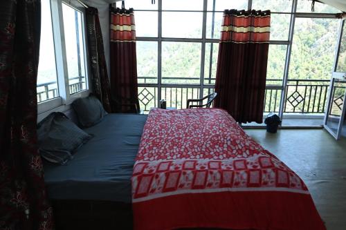 Cama o camas de una habitación en NamahStay Dhanaulti