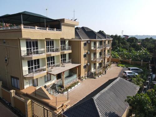 an aerial view of a building with a parking lot at Efrona Homes in Kampala