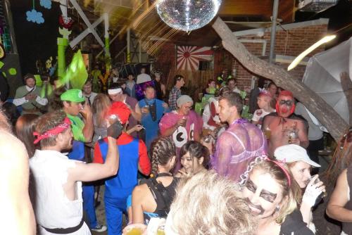 a group of people dressed up in costumes at a party at Old Fire Station Backpackers in Fremantle