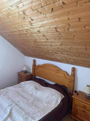 Postel nebo postele na pokoji v ubytování Maison au cœur des Hautes-Alpes