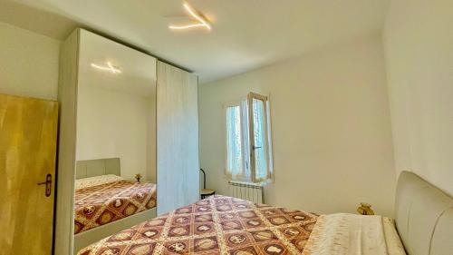 Ένα ή περισσότερα κρεβάτια σε δωμάτιο στο Villetta Niccolò