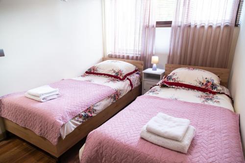 Ένα ή περισσότερα κρεβάτια σε δωμάτιο στο Apartament BonTon