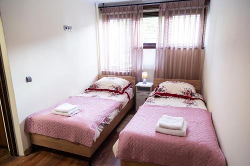 Ένα ή περισσότερα κρεβάτια σε δωμάτιο στο Apartament BonTon