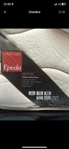 a picture of a mattress with a label on it at Chambre De L étang in Saint-Paul