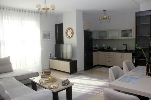 Kuchyň nebo kuchyňský kout v ubytování Apartament Shkoder