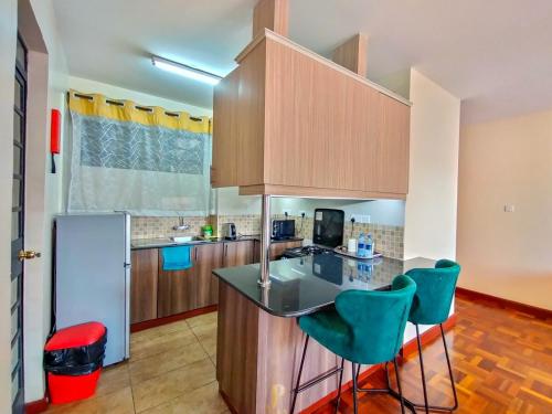 Η κουζίνα ή μικρή κουζίνα στο Elite 2 bedroom westlands