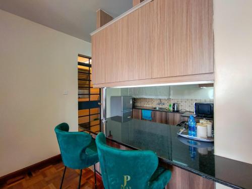 Η κουζίνα ή μικρή κουζίνα στο Elite 2 bedroom westlands