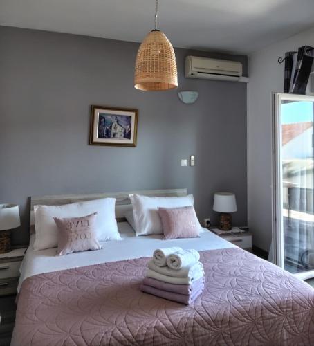 Postel nebo postele na pokoji v ubytování B&B Buzolic