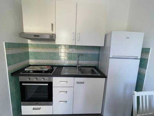 Kuchyň nebo kuchyňský kout v ubytování Residence Andrea a mare