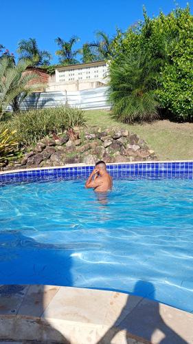 Kolam renang di atau dekat dengan Flat 202 Topo da Montanha