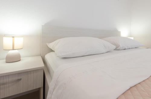 Posteľ alebo postele v izbe v ubytovaní Villa Laura