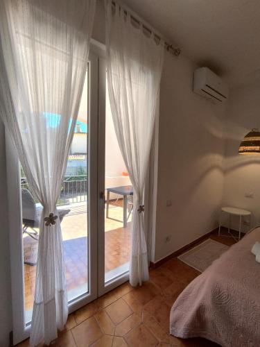 Letto o letti in una camera di Villa Rosa