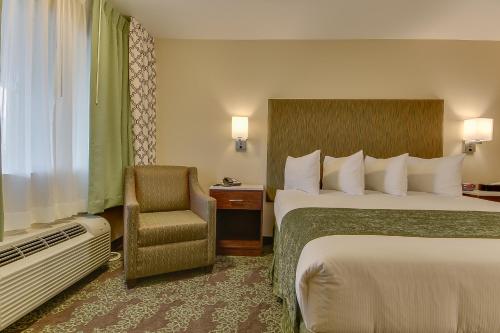 Ένα ή περισσότερα κρεβάτια σε δωμάτιο στο Vagabond Inn Bishop