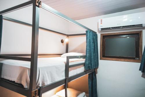 Katil atau katil-katil dalam bilik di Local Hostel Novo Airão