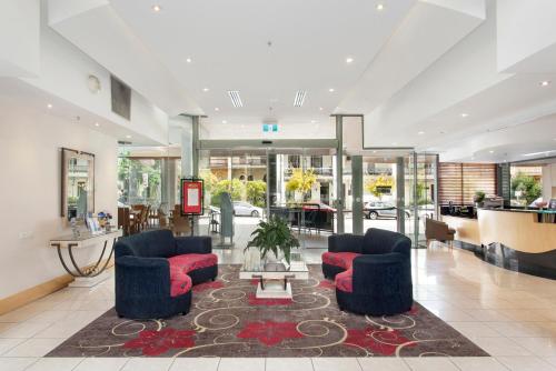 Zona de estar de Melbourne Metropole Central Official