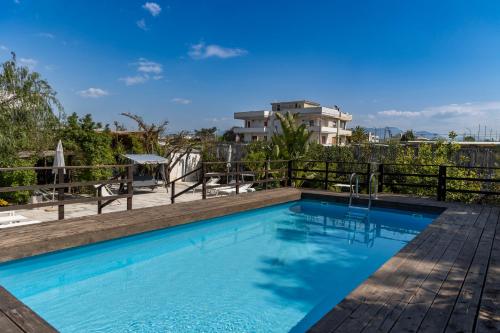 a swimming pool on top of a building at Residence O'Sole Mio Pompei in Pompei