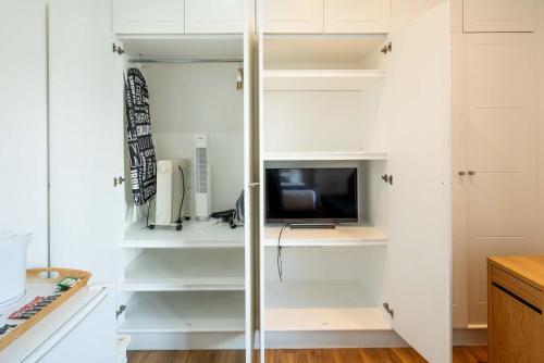Kuchyň nebo kuchyňský kout v ubytování Equitable Hotel