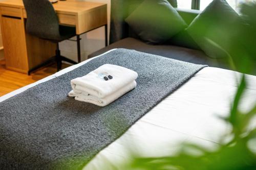 Postel nebo postele na pokoji v ubytování Equitable Hotel