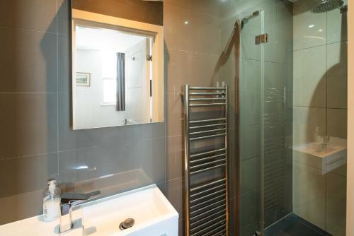 Koupelna v ubytování Equitable Hotel