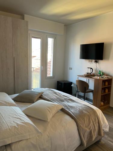 Postel nebo postele na pokoji v ubytování Holiday house - Como center