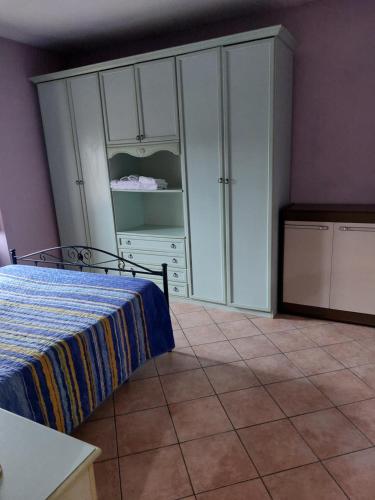 Ένα ή περισσότερα κρεβάτια σε δωμάτιο στο Agriturismo Roccamaia