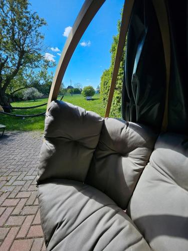 a close up of a sleeping bag in a tent at Landhaus Charlotte - Feldblick in Wassersuppe