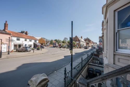 a view of a street in a small town at Bramley House Apartment in Southwold
