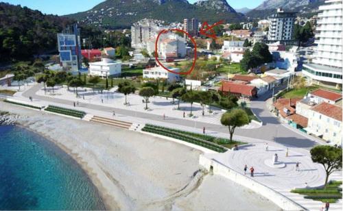 an aerial view of a beach with a red circle at Sea&Sun in Sutomore