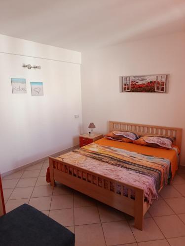 a bedroom with two beds in a room at Relax beach San Vito lo Capo in San Vito lo Capo