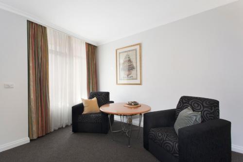 Zona de estar de Melbourne Metropole Central Official