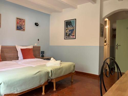 Postel nebo postele na pokoji v ubytování La Bastide du Val