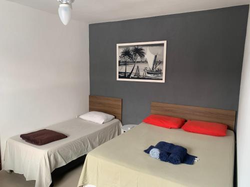 Postel nebo postele na pokoji v ubytování Aloha Beach Temporada