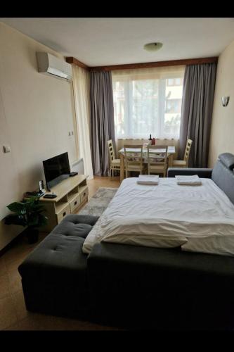 Postel nebo postele na pokoji v ubytování Pirin Golf Hotel & Spa