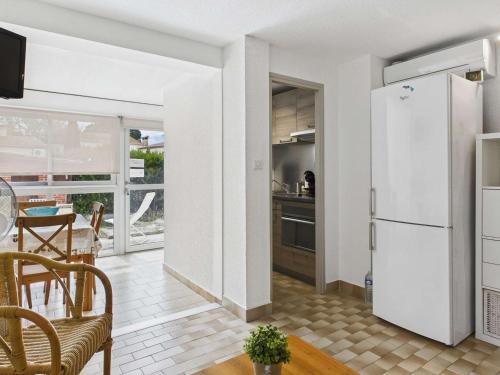 Appartement T3 RDC avec Terrasse et Climatisation - FR-1-423-325