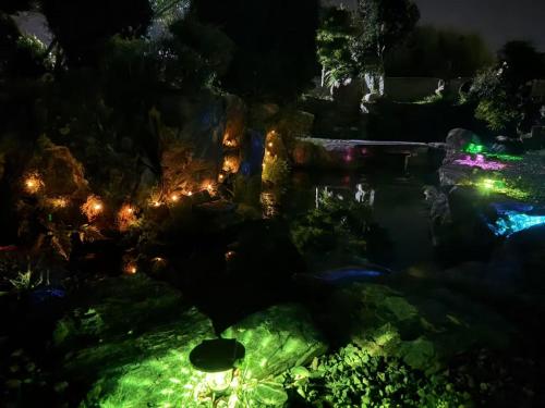 an aerial view of a waterfall at night at Shiga Biwa Lake Shanshui House in Takashima