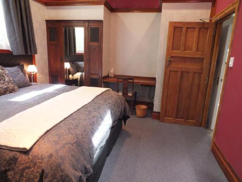 Katil atau katil-katil dalam bilik di Reef Cottage accommodation