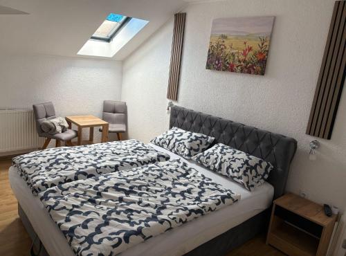 Postel nebo postele na pokoji v ubytování Apartmani D&D