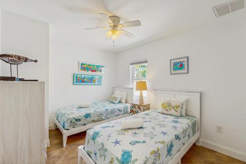 Voodi või voodid majutusasutuse Sea's The Day toas