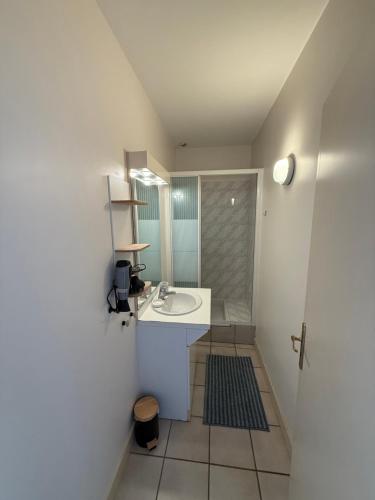 Koupelna v ubytování Appartement vue mer plein centre Arcachon