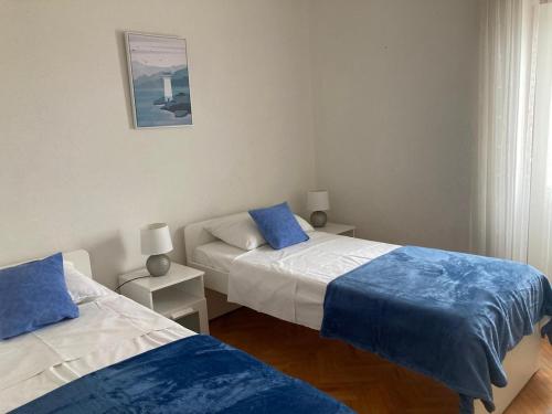 Postel nebo postele na pokoji v ubytování Apartment L&K