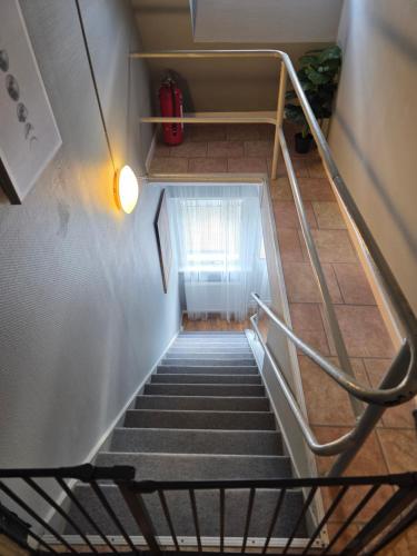 a view of a staircase in a building at Hyllstofta lägenhet in Klippan