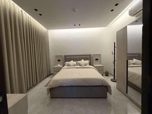 Katil atau katil-katil dalam bilik di Elegant Room Apartment and Self-entry