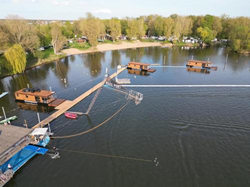 an aerial view of a dock on a lake at House Boat s výhledem na Wake Port in Brandýs nad Labem-Stará Boleslav