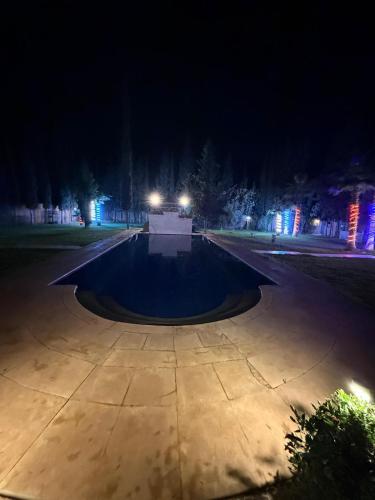 a skate park at night with a skateboard ramp at Ara Villa in Marrakech