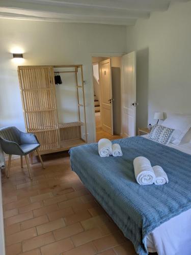 Una cama o camas en una habitación de B&B Can Jan
